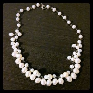 Faux pearl necklace.
